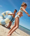 Maillot de bain fille 2 pièces à finitions dentelées et motifs exotiques
